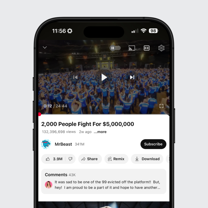 a close up of a cell phone with a YouTube video on the screen